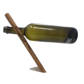 Handgemachter Weinhalter aus Olivenholz handgefertigt auf Mallorca exklusives Produkt schwebende Flasche