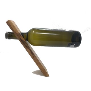 Handmade wine holder made of olive wood handmade in Mallorca exclusive product floating bottle