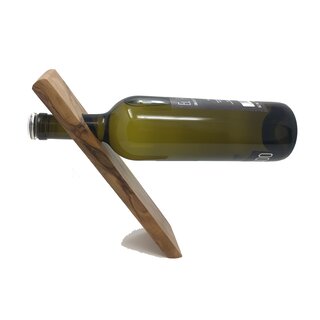 Handmade wine holder made of olive wood handmade in Mallorca exclusive product floating bottle