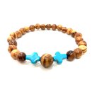 Bracelet made of olive wood beads with turquoise crucifix...