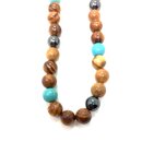 Necklace made of olive wood beads with turquoise stone...